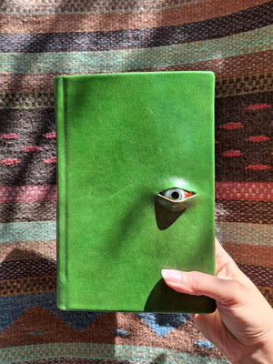 NIDIA ROJAS LEATHER NOTEBOOK WITH EYE